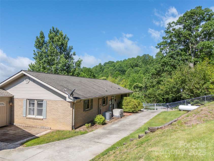 418 Mountain Page Road, Saluda, NC 28773.  MLS# CAR4315748, YatesRealty ID 14636. 