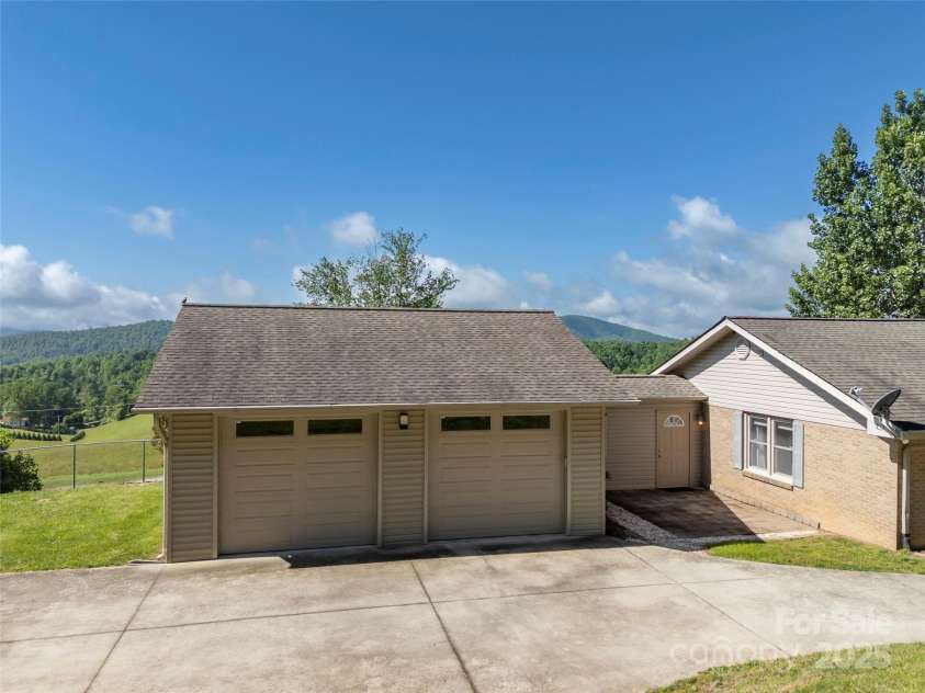 418 Mountain Page Road, Saluda, NC 28773.  MLS# CAR4315748, YatesRealty ID 14636. 