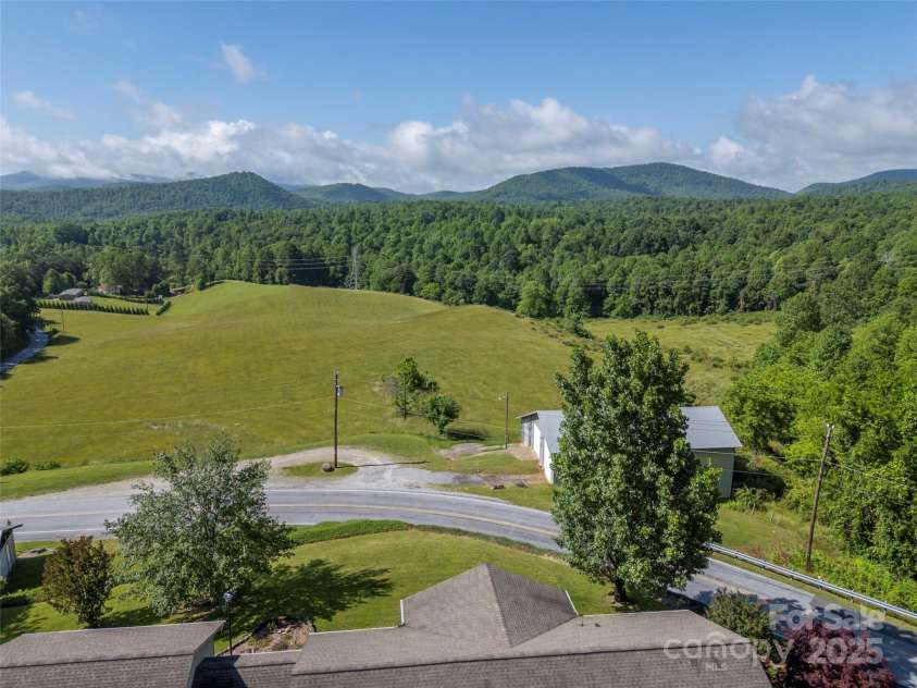 418 Mountain Page Road, Saluda, NC 28773.  MLS# CAR4315748, YatesRealty ID 14636. 