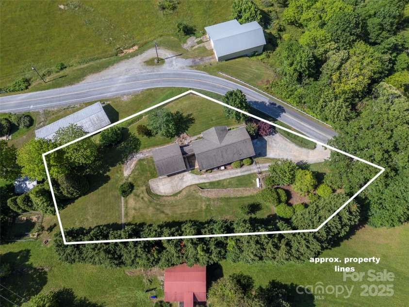 418 Mountain Page Road, Saluda, NC 28773.  MLS# CAR4315748, YatesRealty ID 14636. 