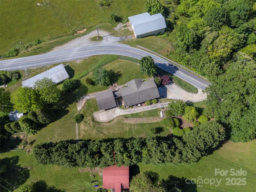 418 Mountain Page Road, Saluda, NC 28773.  MLS# CAR4315748, YatesRealty ID 14636. 