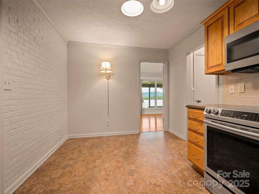 418 Mountain Page Road, Saluda, NC 28773.  MLS# CAR4315748, YatesRealty ID 14636. 