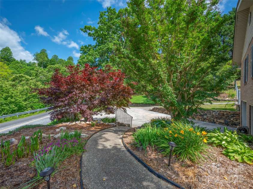 418 Mountain Page Road, Saluda, NC 28773.  MLS# CAR4315748, YatesRealty ID 14636. 