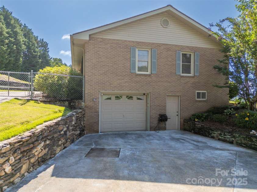 418 Mountain Page Road, Saluda, NC 28773.  MLS# CAR4315748, YatesRealty ID 14636. 