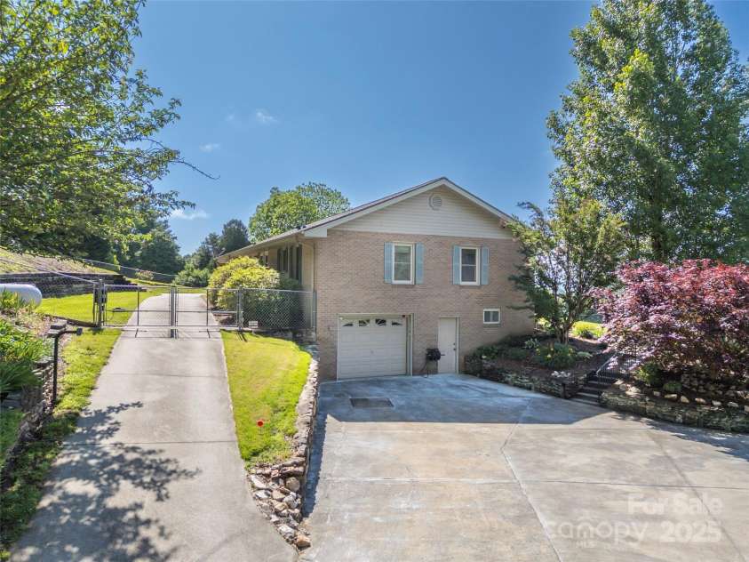 418 Mountain Page Road, Saluda, NC 28773.  MLS# CAR4315748, YatesRealty ID 14636. 