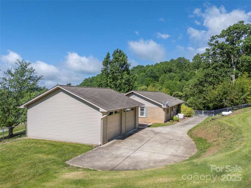 418 Mountain Page Road, Saluda, NC 28773.  MLS# CAR4315748, YatesRealty ID 14636. 