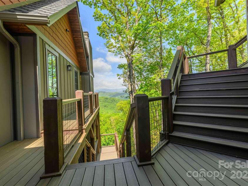 615 Macallan Drive, Waynesville, NC 28786.  MLS# CAR4262771, YatesRealty ID 14638. Deck Stairs