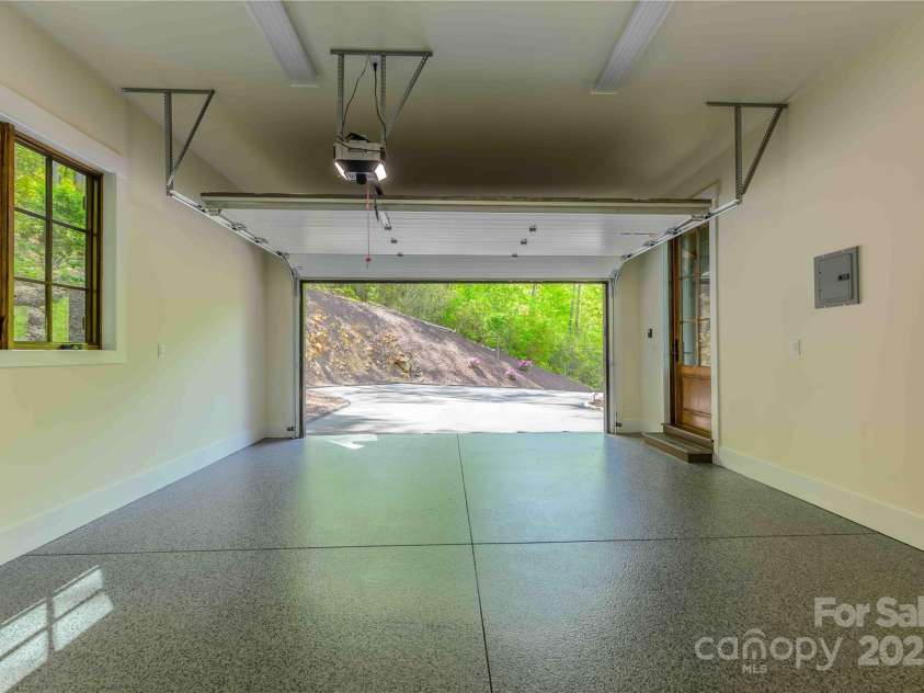 615 Macallan Drive, Waynesville, NC 28786.  MLS# CAR4262771, YatesRealty ID 14638. Garage