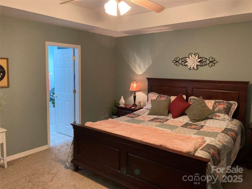 2339 Wednesbury Court, Kannapolis, NC 28083.  MLS# CAR4257609, YatesRealty ID 14641. View toward tiled primary bath and massive 7' by 8' walk-in closet