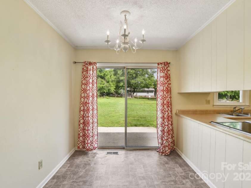 1181 Runway Drive, Hendersonville, NC 28792.  MLS# CAR4258392, YatesRealty ID 14643. 