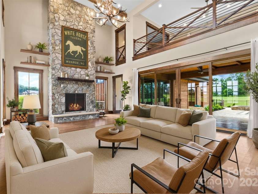 1822 Irby Road, Monroe, NC 28112.  MLS# CAR4259856, YatesRealty ID 14646. Staged Photo of Great 2 Story Great Room