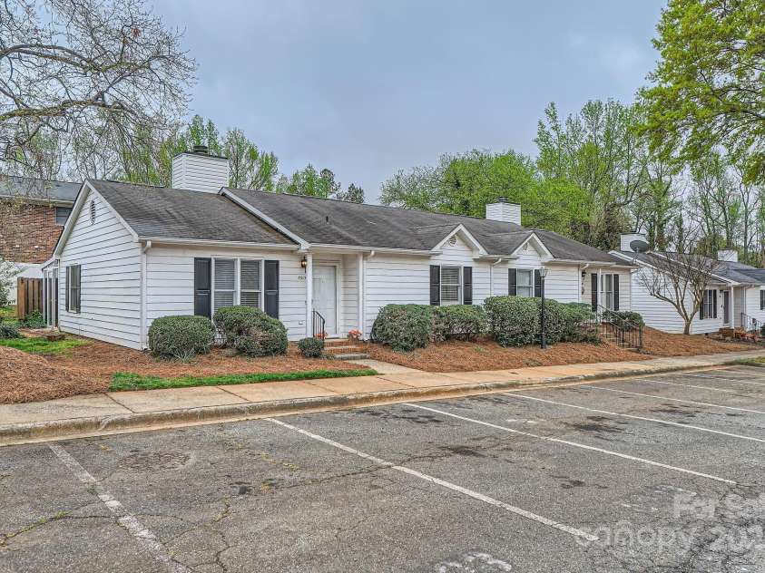 5913 Crape Myrtle Lane, Charlotte, NC 28216.  MLS# CAR4241207, YatesRealty ID 14647. Assigned parking for 2!