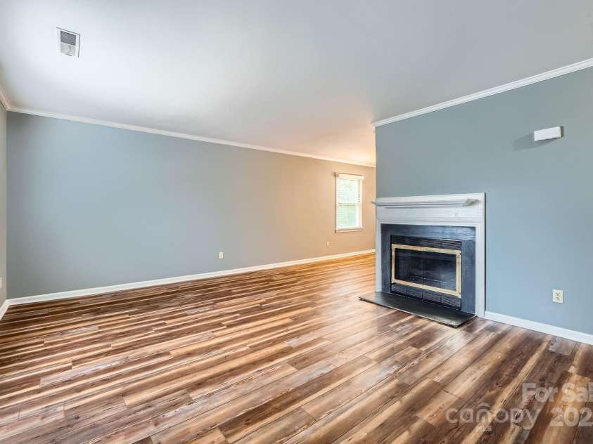 5913 Crape Myrtle Lane, Charlotte, NC 28216.  MLS# CAR4241207, YatesRealty ID 14647. Enjoy the newer flooring throughout the entire home!
