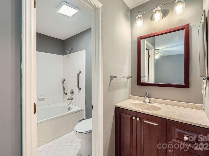5913 Crape Myrtle Lane, Charlotte, NC 28216.  MLS# CAR4241207, YatesRealty ID 14647. Ensuite Bath
