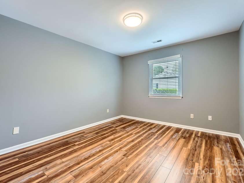 5913 Crape Myrtle Lane, Charlotte, NC 28216.  MLS# CAR4241207, YatesRealty ID 14647. Secondary spacious bedroom.