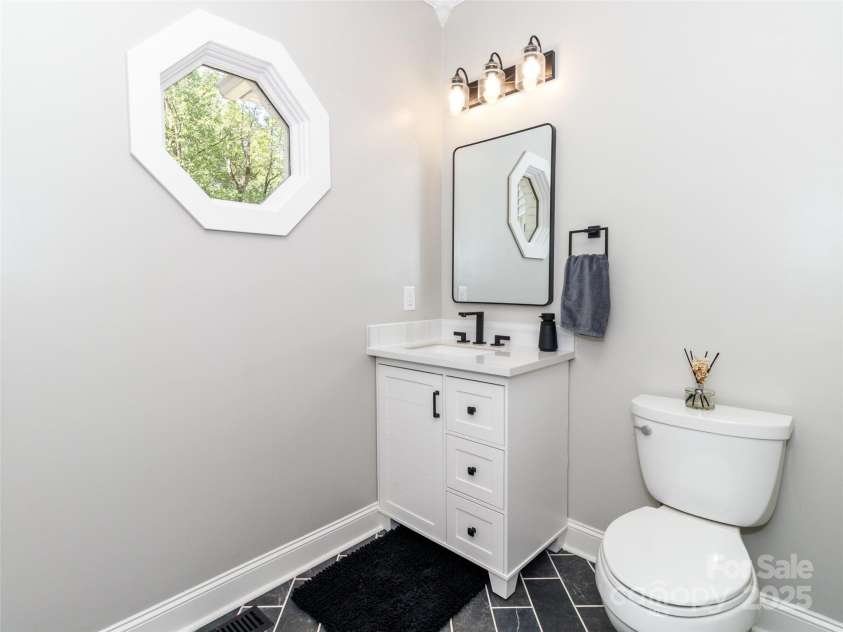 207 Windsor Greene Drive, Monroe, NC 28110.  MLS# CAR4235404, YatesRealty ID 14651. Half Bath