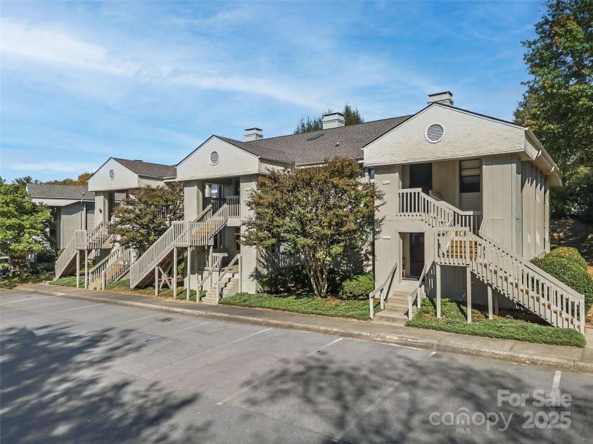 1203 Abbey Circle, Asheville, NC 28805.  MLS# CAR4315432, YatesRealty ID 14657. 1203 is the middle unit.