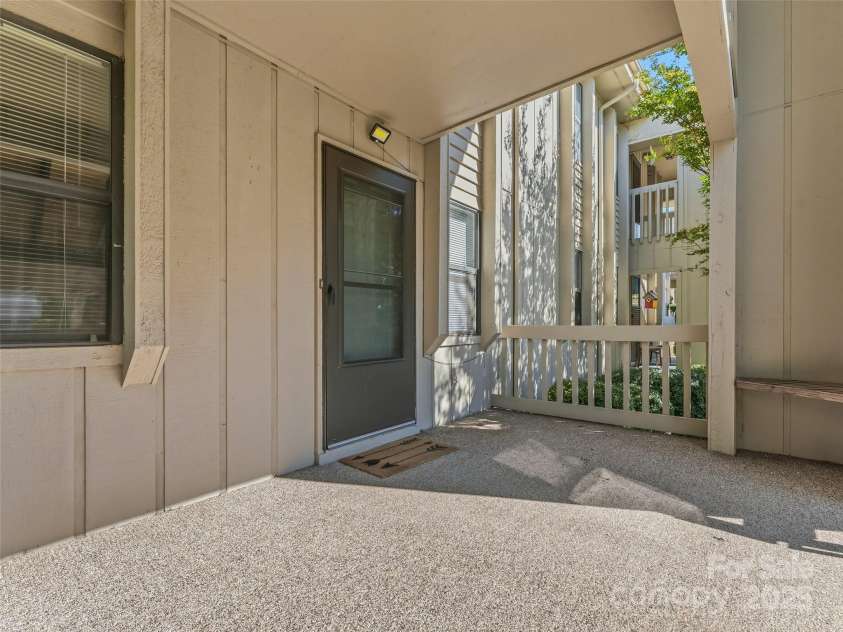 1203 Abbey Circle, Asheville, NC 28805.  MLS# CAR4315432, YatesRealty ID 14657. Bring all your potted plants!