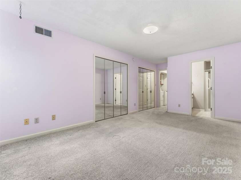 1203 Abbey Circle, Asheville, NC 28805.  MLS# CAR4315432, YatesRealty ID 14657. Double closets in the main bedroom