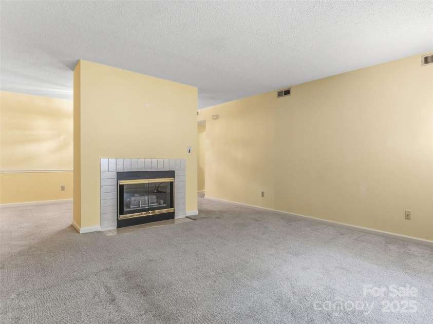 1203 Abbey Circle, Asheville, NC 28805.  MLS# CAR4315432, YatesRealty ID 14657. Gas fireplace