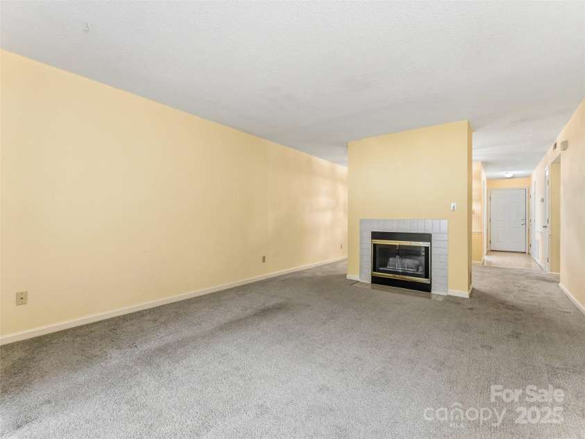1203 Abbey Circle, Asheville, NC 28805.  MLS# CAR4315432, YatesRealty ID 14657. Living room