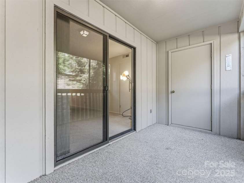 1203 Abbey Circle, Asheville, NC 28805.  MLS# CAR4315432, YatesRealty ID 14657. Pack porch