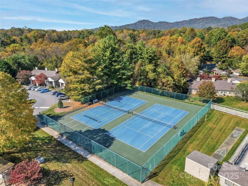 1203 Abbey Circle, Asheville, NC 28805.  MLS# CAR4315432, YatesRealty ID 14657. Tennis courts