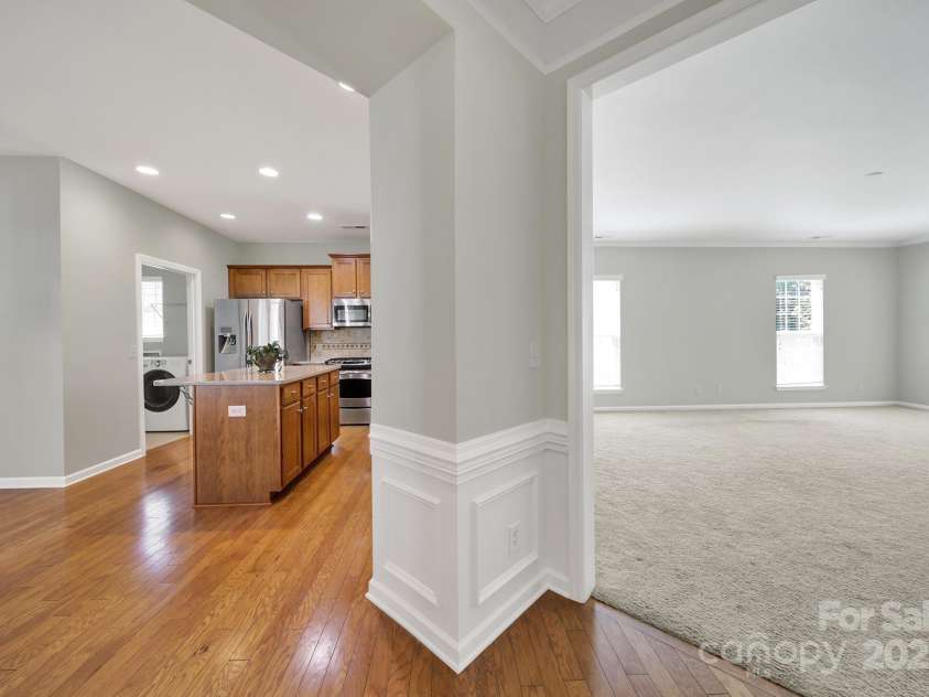 8107 Crater Lake Drive, Indian Land, SC 29707.  MLS# CAR4233120, YatesRealty ID 14662. Beautiful hardwood floors in kitchen and foyer.