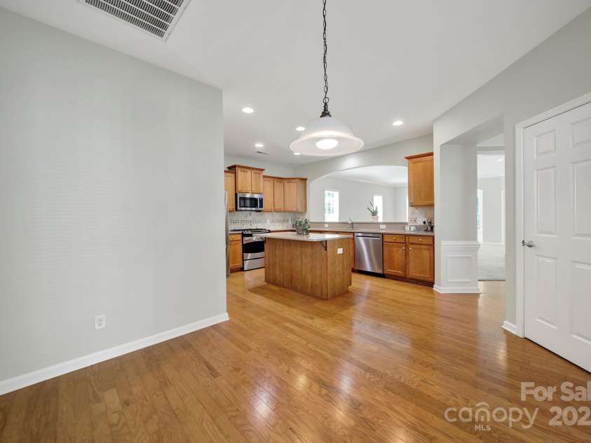 8107 Crater Lake Drive, Indian Land, SC 29707.  MLS# CAR4233120, YatesRealty ID 14662. Dining area that could fit a 10-12 person table!
