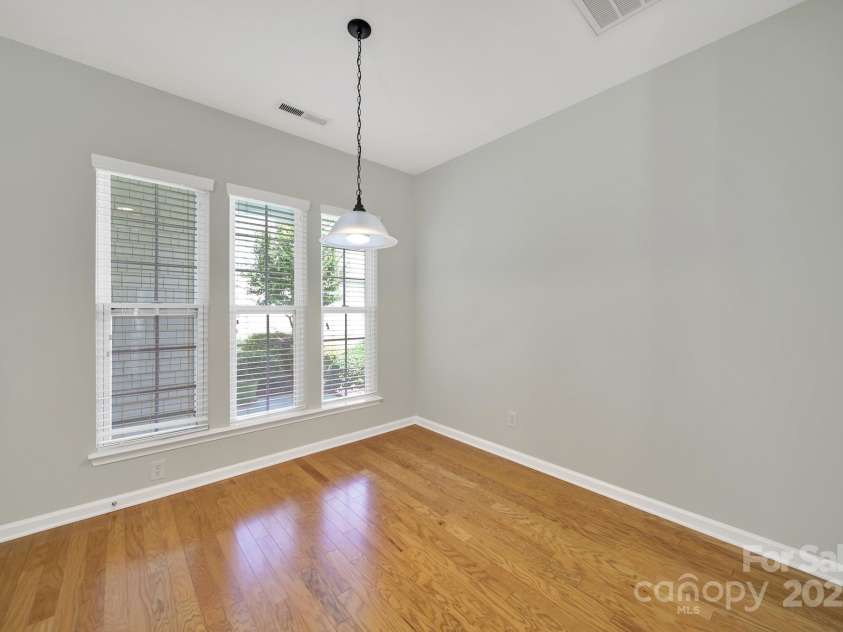 8107 Crater Lake Drive, Indian Land, SC 29707.  MLS# CAR4233120, YatesRealty ID 14662. Front porch view from dining area.