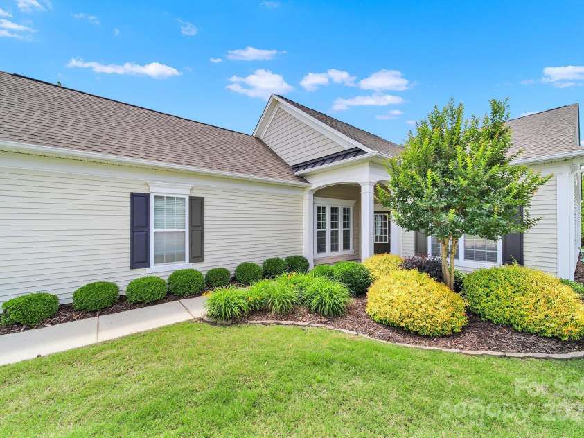 8107 Crater Lake Drive, Indian Land, SC 29707.  MLS# CAR4233120, YatesRealty ID 14662. Inviting covered front porch.