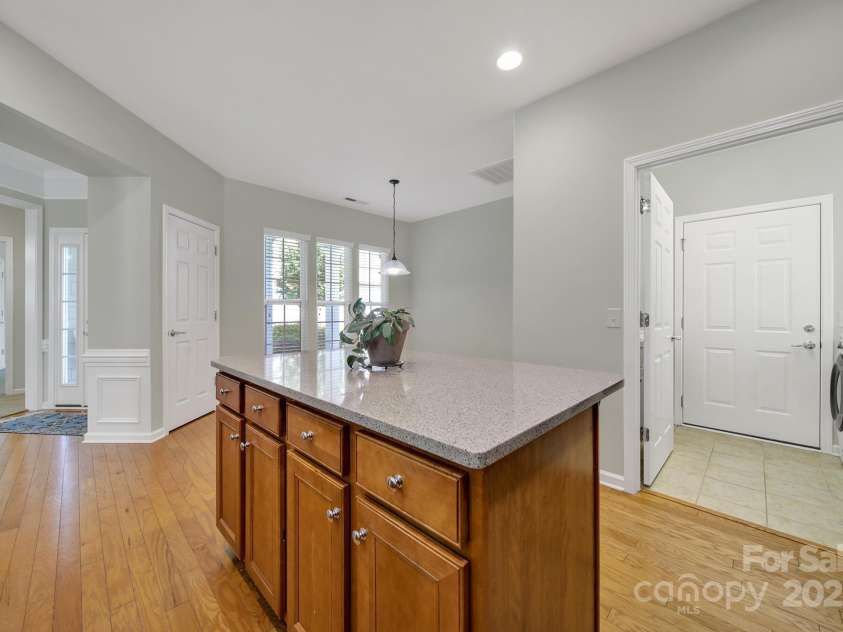 8107 Crater Lake Drive, Indian Land, SC 29707.  MLS# CAR4233120, YatesRealty ID 14662. Mud room w/ sink between kitchen & extra-large garage with 4-foot extension.