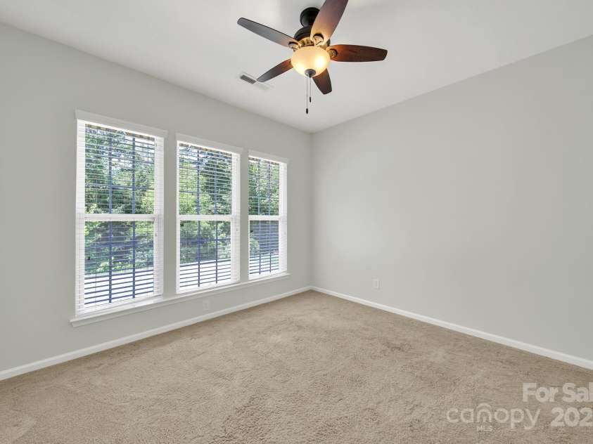 8107 Crater Lake Drive, Indian Land, SC 29707.  MLS# CAR4233120, YatesRealty ID 14662. Office overlooking back patio.