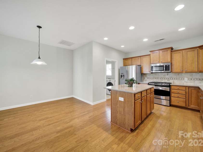 8107 Crater Lake Drive, Indian Land, SC 29707.  MLS# CAR4233120, YatesRealty ID 14662. Spacious dining area in Kitchen with island seating too!
