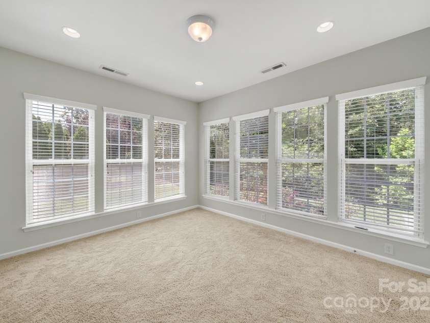 8107 Crater Lake Drive, Indian Land, SC 29707.  MLS# CAR4233120, YatesRealty ID 14662. Sunroom to patio