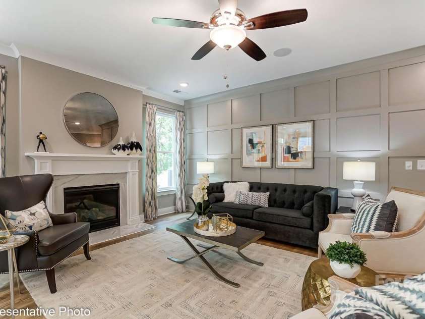 102 Ellsworth Road, Mooresville, NC 28115.  MLS# CAR4216128, YatesRealty ID 14668. Living room with Fireplace - this home will have a Cosmo Fireplace with shiplap wall