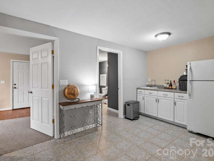 29 Muirfield Drive, Arden, NC 28704.  MLS# CAR4364187, YatesRealty ID 14672. Kitchenette in Lower Level 