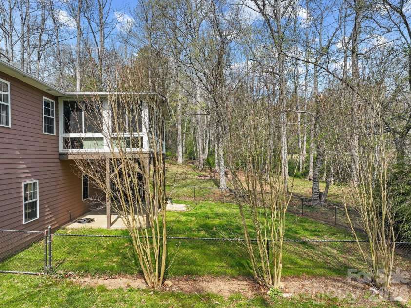 29 Muirfield Drive, Arden, NC 28704.  MLS# CAR4364187, YatesRealty ID 14672. View from Back Yard 
