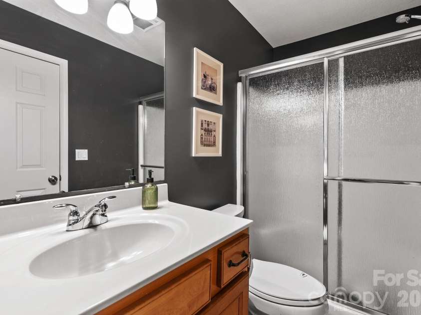 29 Muirfield Drive, Arden, NC 28704.  MLS# CAR4364187, YatesRealty ID 14672. Walk in Shower 