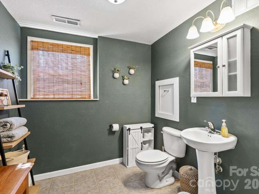 29 Muirfield Drive, Arden, NC 28704.  MLS# CAR4364187, YatesRealty ID 14672. Walk In Shower 