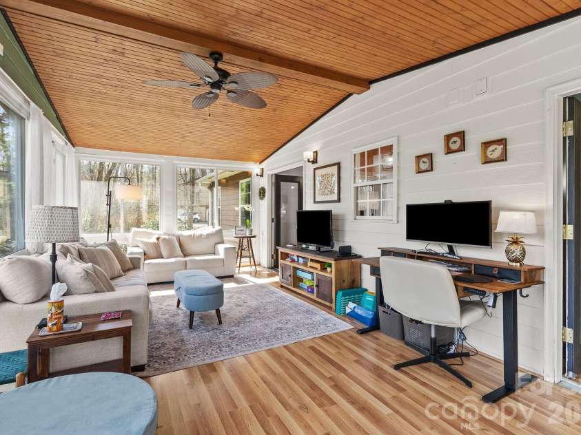 29 Muirfield Drive, Arden, NC 28704.  MLS# CAR4364187, YatesRealty ID 14672. Workspace in Sunroom 