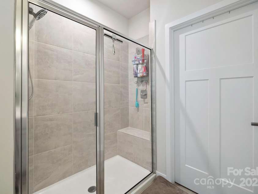 6242 Ashton Park Drive, Denver, NC 28037.  MLS# CAR4252671, YatesRealty ID 14673. Master Shower w/ Bench