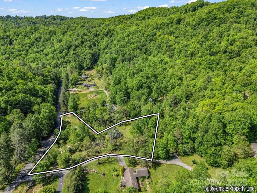 51 Moffitt Road, Horse Shoe, NC 28742.  MLS# CAR4257739, YatesRealty ID 14674. Aerial of property