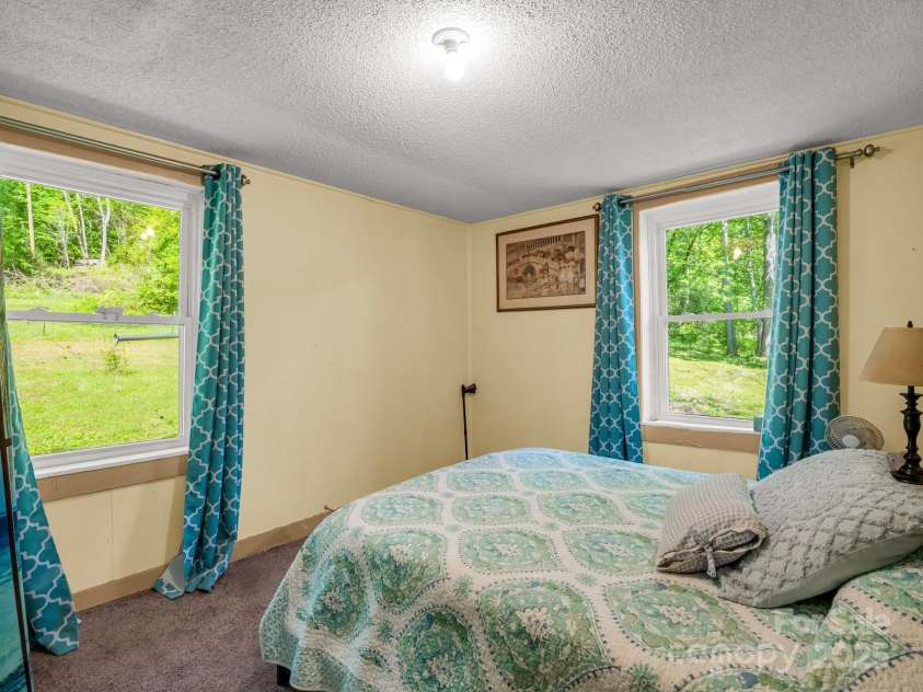 51 Moffitt Road, Horse Shoe, NC 28742.  MLS# CAR4257739, YatesRealty ID 14674. Bedroom
