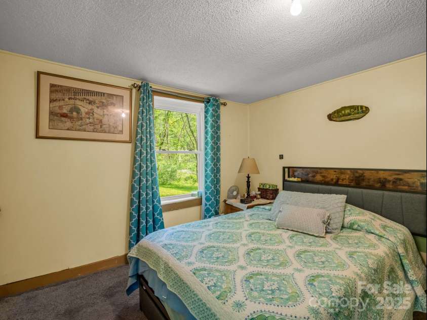51 Moffitt Road, Horse Shoe, NC 28742.  MLS# CAR4257739, YatesRealty ID 14674. Bedroom on Main Level