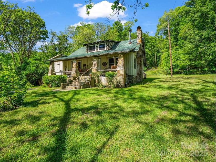 51 Moffitt Road, Horse Shoe, NC 28742.  MLS# CAR4257739, YatesRealty ID 14674. Front of Cabin
