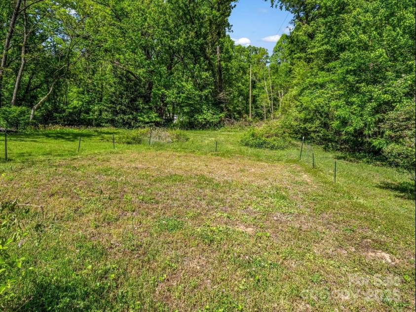 51 Moffitt Road, Horse Shoe, NC 28742.  MLS# CAR4257739, YatesRealty ID 14674. Garden area - used for many many years to grow vegetables and flowers