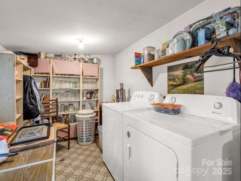 51 Moffitt Road, Horse Shoe, NC 28742.  MLS# CAR4257739, YatesRealty ID 14674. Laundry area with lots of storage
