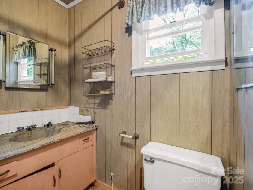 51 Moffitt Road, Horse Shoe, NC 28742.  MLS# CAR4257739, YatesRealty ID 14674. Non functional second bathroom