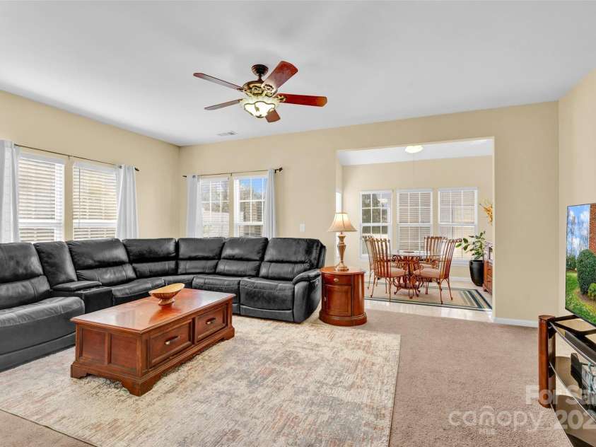 1965 Charlotte Highway, Mooresville, NC 28115.  MLS# CAR4234182, YatesRealty ID 14676. Great Room & Sunroom